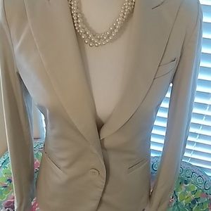 H&M stylish and versatile two button, tan jacket